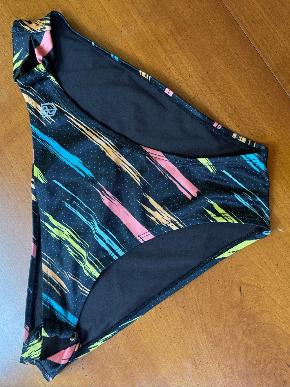 Born Primitive Black Swim Bottoms with Teal Pink Yellow Orange Brushstroke Print